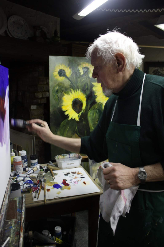 Walter Lebbe painting watercolours in his studio