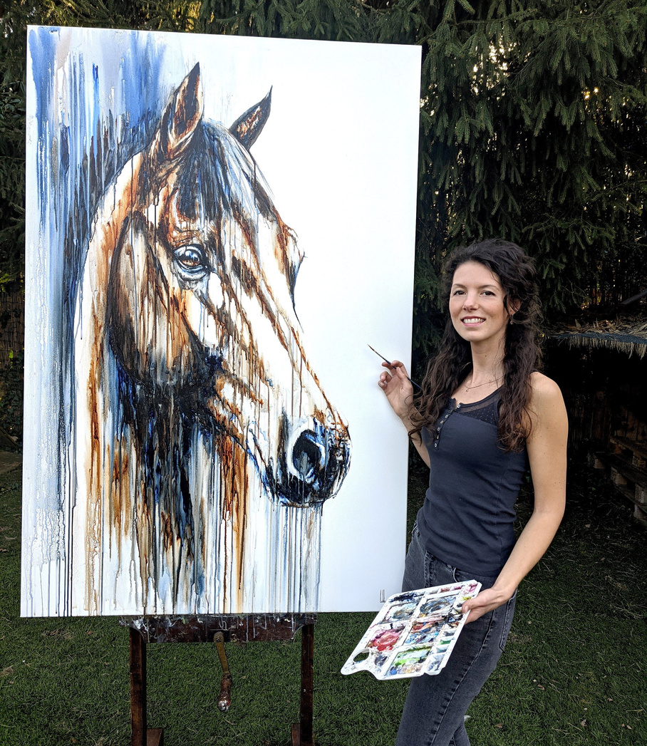 Marjo Lebbe with her equine artwork